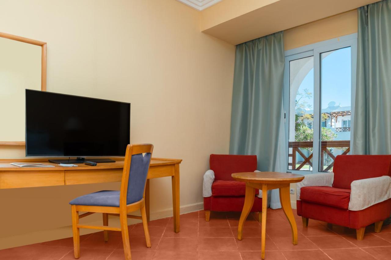 Hotel Sharm Dreams Vacation Club - Aqua Park Exterior foto A room at the hotel